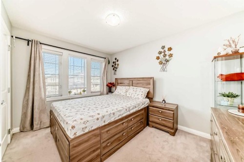 423 Redstone Drive Ne, Calgary, AB - Indoor Photo Showing Bedroom