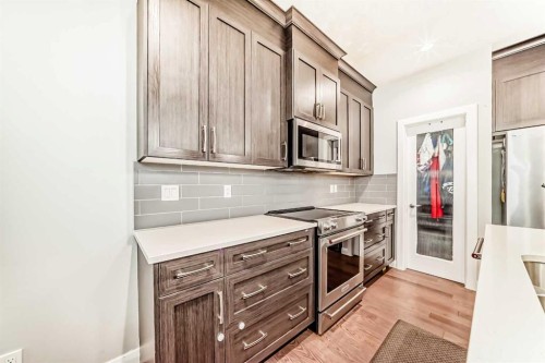 423 Redstone Drive Ne, Calgary, AB - Indoor Photo Showing Kitchen With Upgraded Kitchen