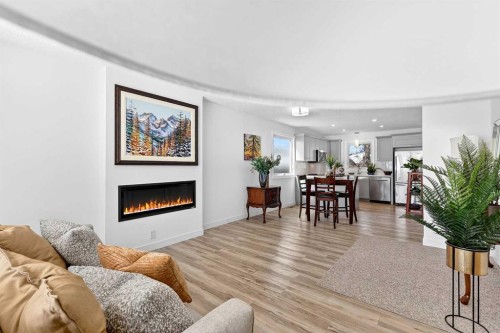 4311 Dovercrest Drive Se, Calgary, AB - Indoor Photo Showing Living Room With Fireplace
