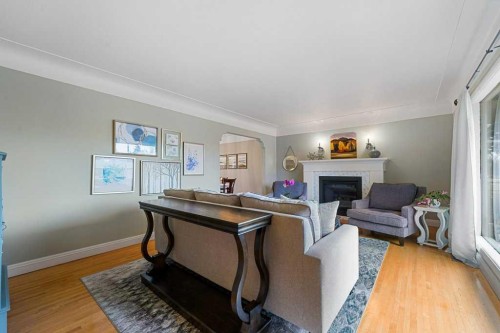 3204 24A Street Sw, Calgary, AB - Indoor Photo Showing Other Room With Fireplace