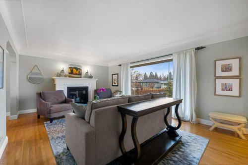 3204 24A Street Sw, Calgary, AB - Indoor Photo Showing Living Room With Fireplace