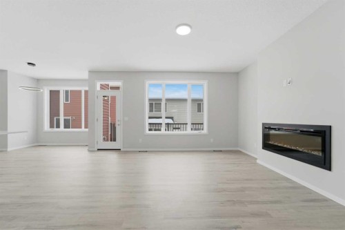 40 Cityline Manor Ne, Calgary, AB - Indoor Photo Showing Living Room With Fireplace