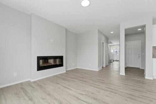 40 Cityline Manor Ne, Calgary, AB - Indoor Photo Showing Living Room With Fireplace