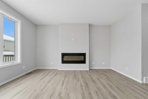 40 Cityline Manor Ne, Calgary, AB - Indoor Photo Showing Living Room With Fireplace