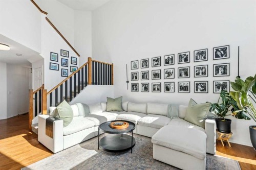 214 Cougarstone Circle Sw, Calgary, AB - Indoor Photo Showing Living Room