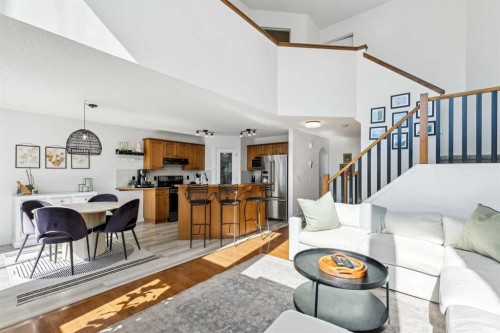 214 Cougarstone Circle Sw, Calgary, AB - Indoor Photo Showing Living Room
