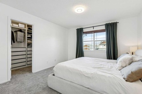 214 Cougarstone Circle Sw, Calgary, AB - Indoor Photo Showing Bedroom