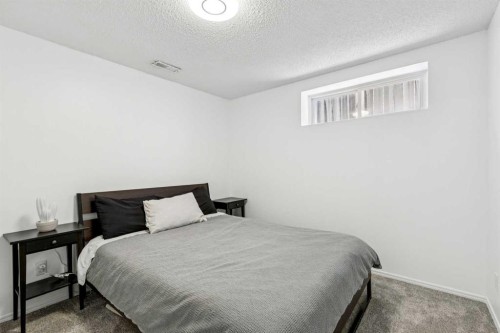 214 Cougarstone Circle Sw, Calgary, AB - Indoor Photo Showing Bedroom