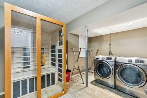 214 Cougarstone Circle Sw, Calgary, AB - Indoor Photo Showing Laundry Room