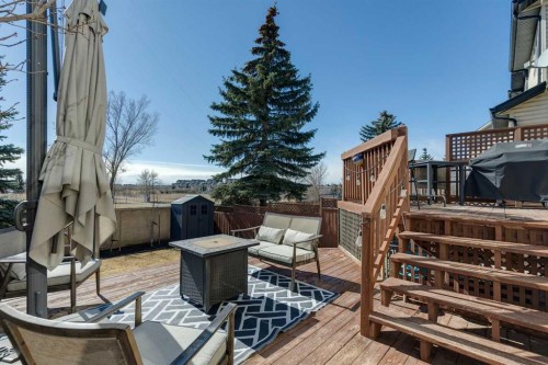 214 Cougarstone Circle Sw, Calgary, AB - Outdoor With Deck Patio Veranda