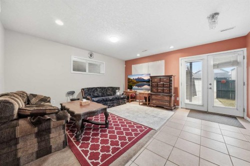 27 Saddleland Way Ne, Calgary, AB - Indoor Photo Showing Living Room