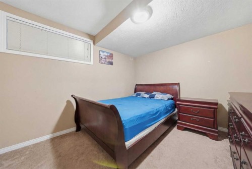 27 Saddleland Way Ne, Calgary, AB - Indoor Photo Showing Bedroom