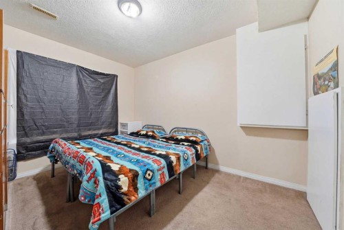 27 Saddleland Way Ne, Calgary, AB - Indoor Photo Showing Bedroom