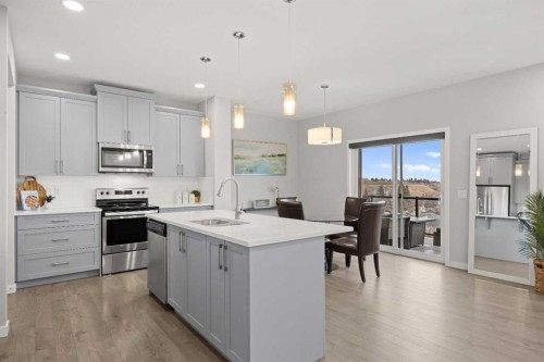 79 Mist Mountain Rise, Okotoks, AB - Indoor Photo Showing Kitchen With Upgraded Kitchen