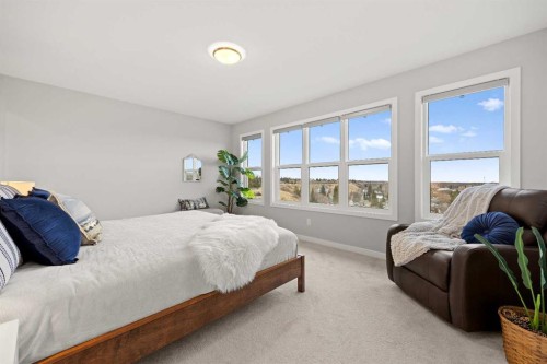 79 Mist Mountain Rise, Okotoks, AB - Indoor Photo Showing Bedroom