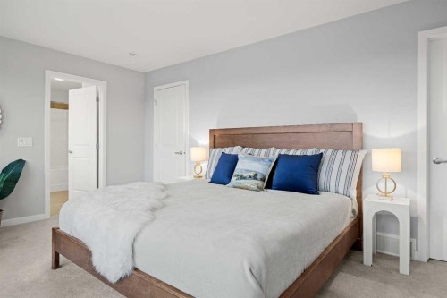 79 Mist Mountain Rise, Okotoks, AB - Indoor Photo Showing Bedroom