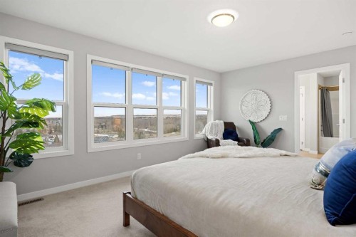 79 Mist Mountain Rise, Okotoks, AB - Indoor Photo Showing Bedroom