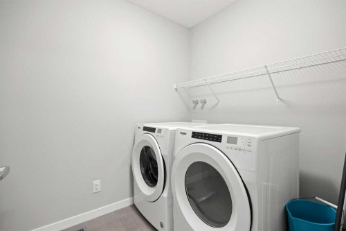 79 Mist Mountain Rise, Okotoks, AB - Indoor Photo Showing Laundry Room