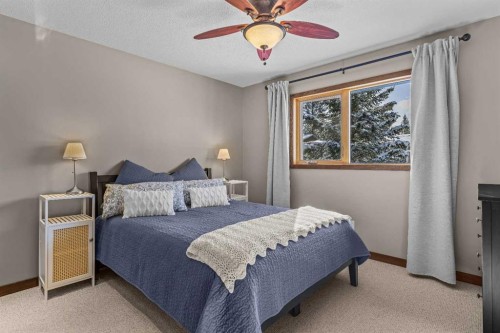 100 Settler Way, Canmore, AB - Indoor Photo Showing Bedroom