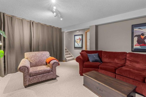 100 Settler Way, Canmore, AB - Indoor Photo Showing Living Room
