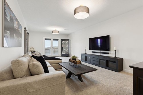 220 Precedence View, Cochrane, AB - Indoor Photo Showing Living Room