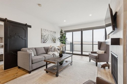 220 Precedence View, Cochrane, AB - Indoor Photo Showing Living Room