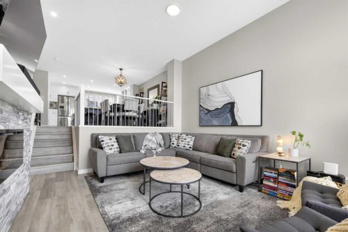 261 Masters Road Se, Calgary, AB - Indoor Photo Showing Living Room With Fireplace