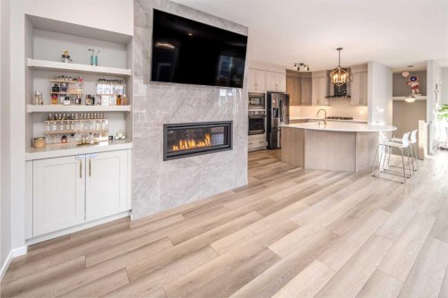 148 Carringham Road Nw, Calgary, AB - Indoor With Fireplace
