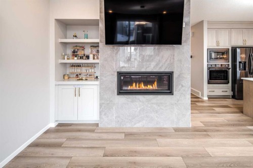 148 Carringham Road Nw, Calgary, AB - Indoor With Fireplace
