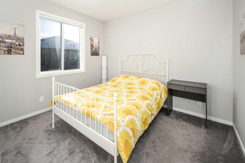 148 Carringham Road Nw, Calgary, AB - Indoor Photo Showing Bedroom