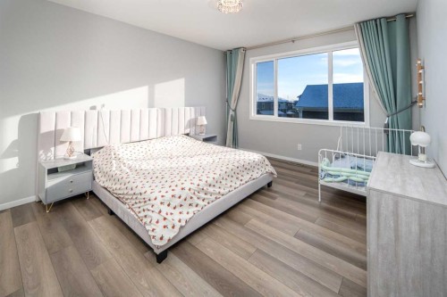 148 Carringham Road Nw, Calgary, AB - Indoor Photo Showing Bedroom