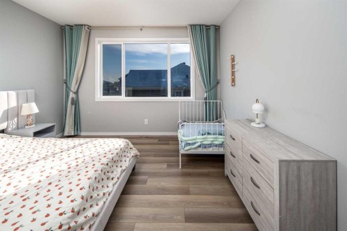 148 Carringham Road Nw, Calgary, AB - Indoor Photo Showing Bedroom