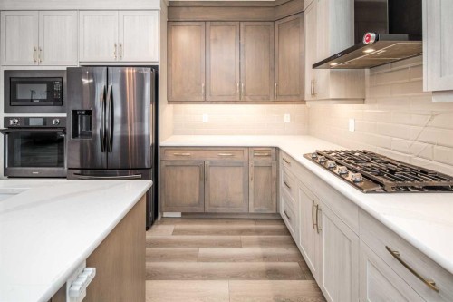 148 Carringham Road Nw, Calgary, AB - Indoor Photo Showing Kitchen With Upgraded Kitchen