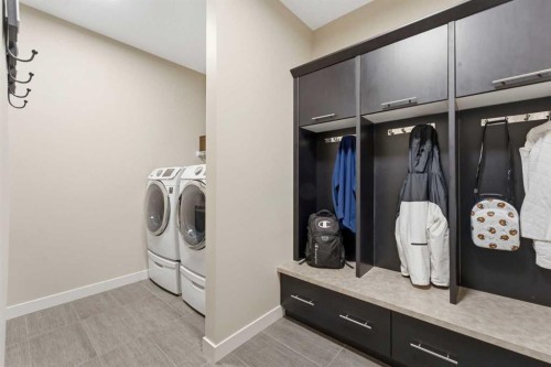 95 Sunset Way, Cochrane, AB - Indoor Photo Showing Laundry Room