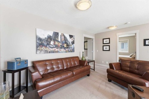 95 Sunset Way, Cochrane, AB - Indoor Photo Showing Living Room