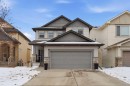 95 Sunset Way, Cochrane, AB  - Outdoor With Facade 