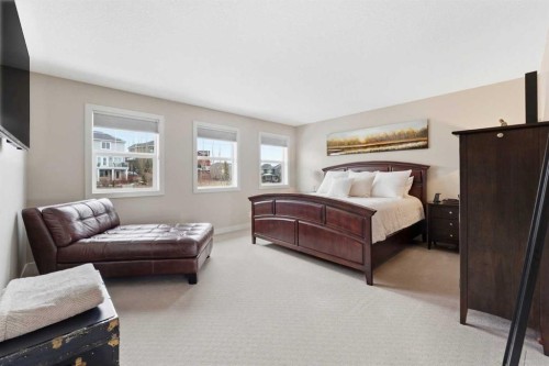95 Sunset Way, Cochrane, AB - Indoor Photo Showing Bedroom