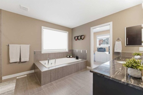 95 Sunset Way, Cochrane, AB - Indoor Photo Showing Bathroom
