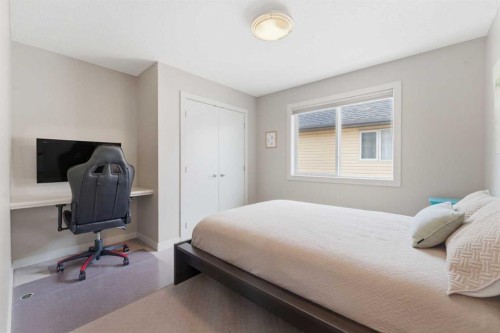 95 Sunset Way, Cochrane, AB - Indoor Photo Showing Bedroom