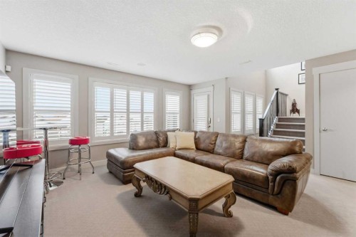 95 Sunset Way, Cochrane, AB - Indoor Photo Showing Living Room