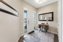 95 Sunset Way, Cochrane, AB  - Indoor Photo Showing Other Room 