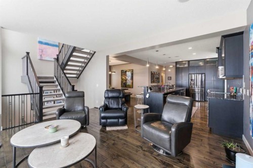 95 Sunset Way, Cochrane, AB - Indoor Photo Showing Living Room