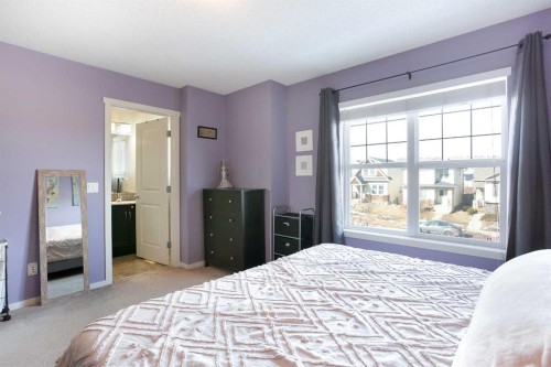 1074 Panatella Boulevard Nw, Calgary, AB - Indoor Photo Showing Bedroom