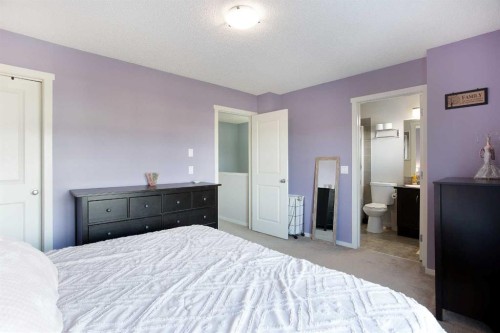 1074 Panatella Boulevard Nw, Calgary, AB - Indoor Photo Showing Bedroom