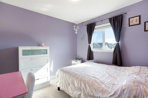 1074 Panatella Boulevard Nw, Calgary, AB - Indoor Photo Showing Bedroom