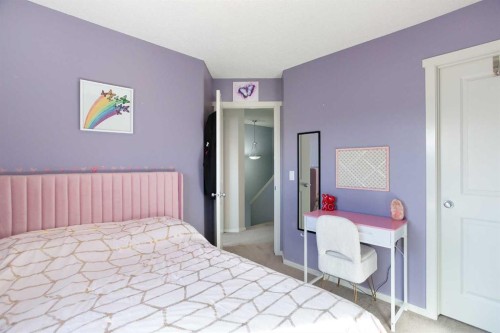 1074 Panatella Boulevard Nw, Calgary, AB - Indoor Photo Showing Bedroom