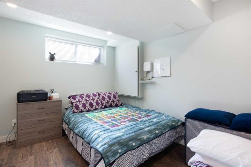 1074 Panatella Boulevard Nw, Calgary, AB - Indoor Photo Showing Bedroom