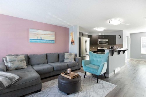 1074 Panatella Boulevard Nw, Calgary, AB - Indoor Photo Showing Living Room