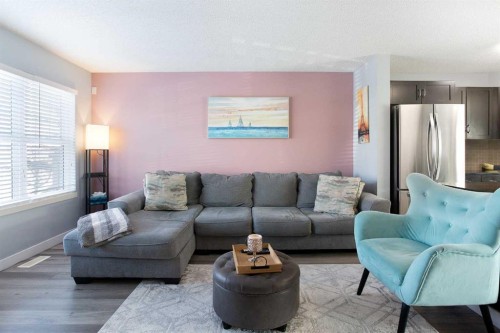 1074 Panatella Boulevard Nw, Calgary, AB - Indoor Photo Showing Living Room