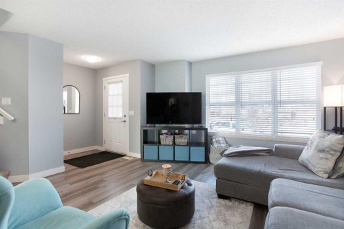 1074 Panatella Boulevard Nw, Calgary, AB - Indoor Photo Showing Living Room